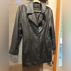 Wilson’s black leather trench